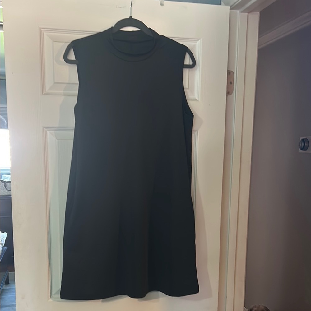Classic Black Sleeveless Dress with Pockets